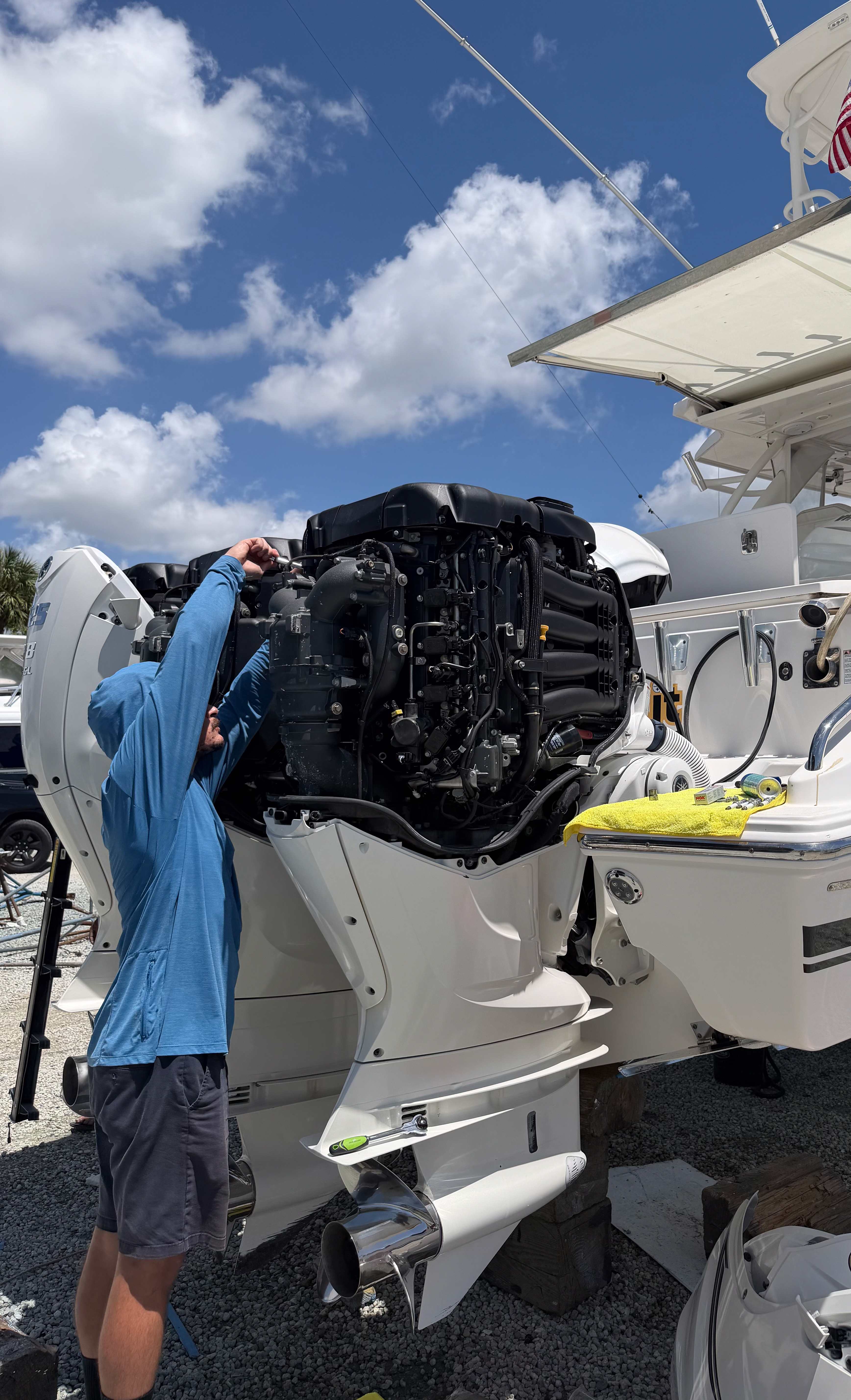 Outboard motor and lower unit during marine mechanical work