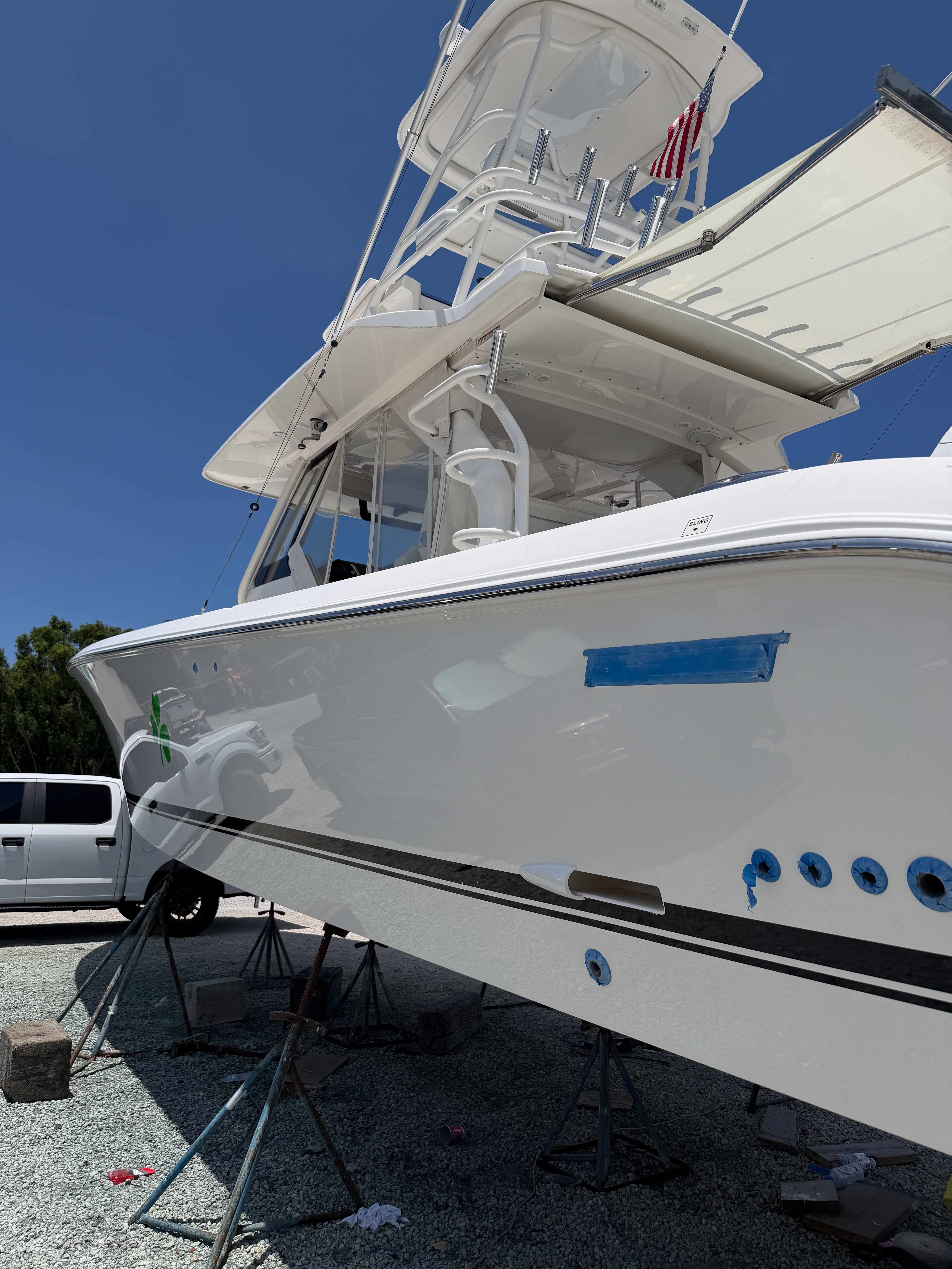 Multiple outboard engines positioned for marine service